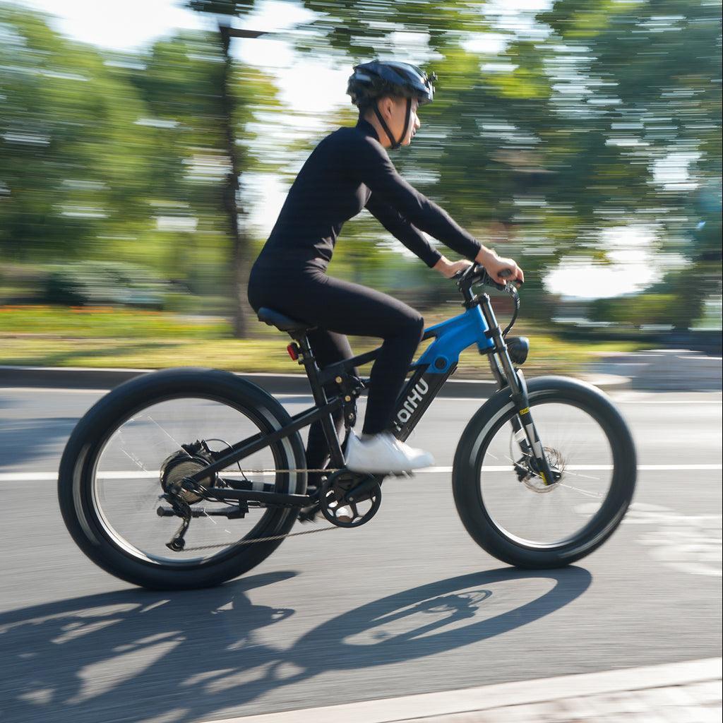 Feihu 750W eMTB on an outdoor trail, showing off its fat tires and powerful motor